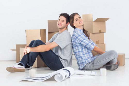 Business move logistics with desks, boxes, and IT items prepared for transport
