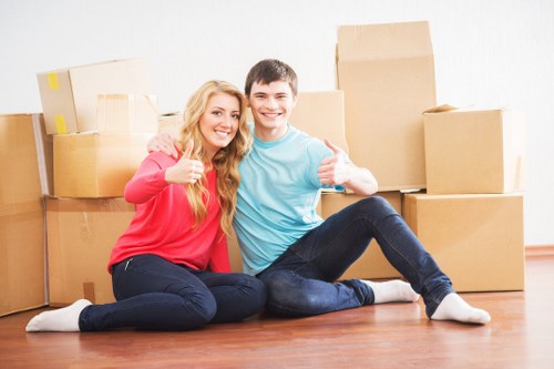 Packed boxes and furniture arranged inside a Hook storage unit