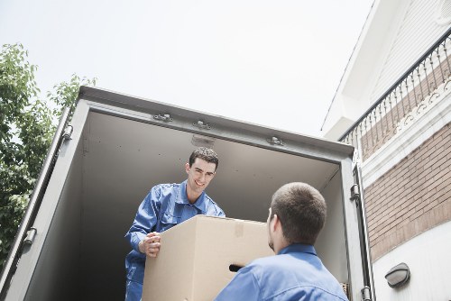 Household moving team handling furniture relocation in Hook