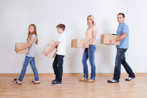 Professional movers handling a flat removal in Hook